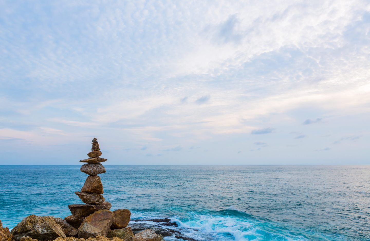 Rock and sea with blue sky